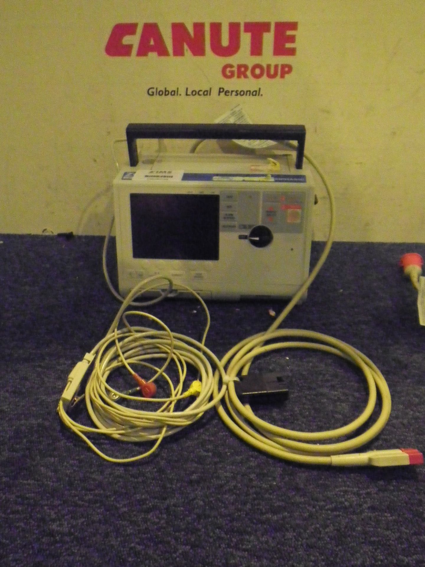 Zoll M Series Biphasic Defibrillator with Battery, ECG Lead and Paddle Lead *Powers Up*