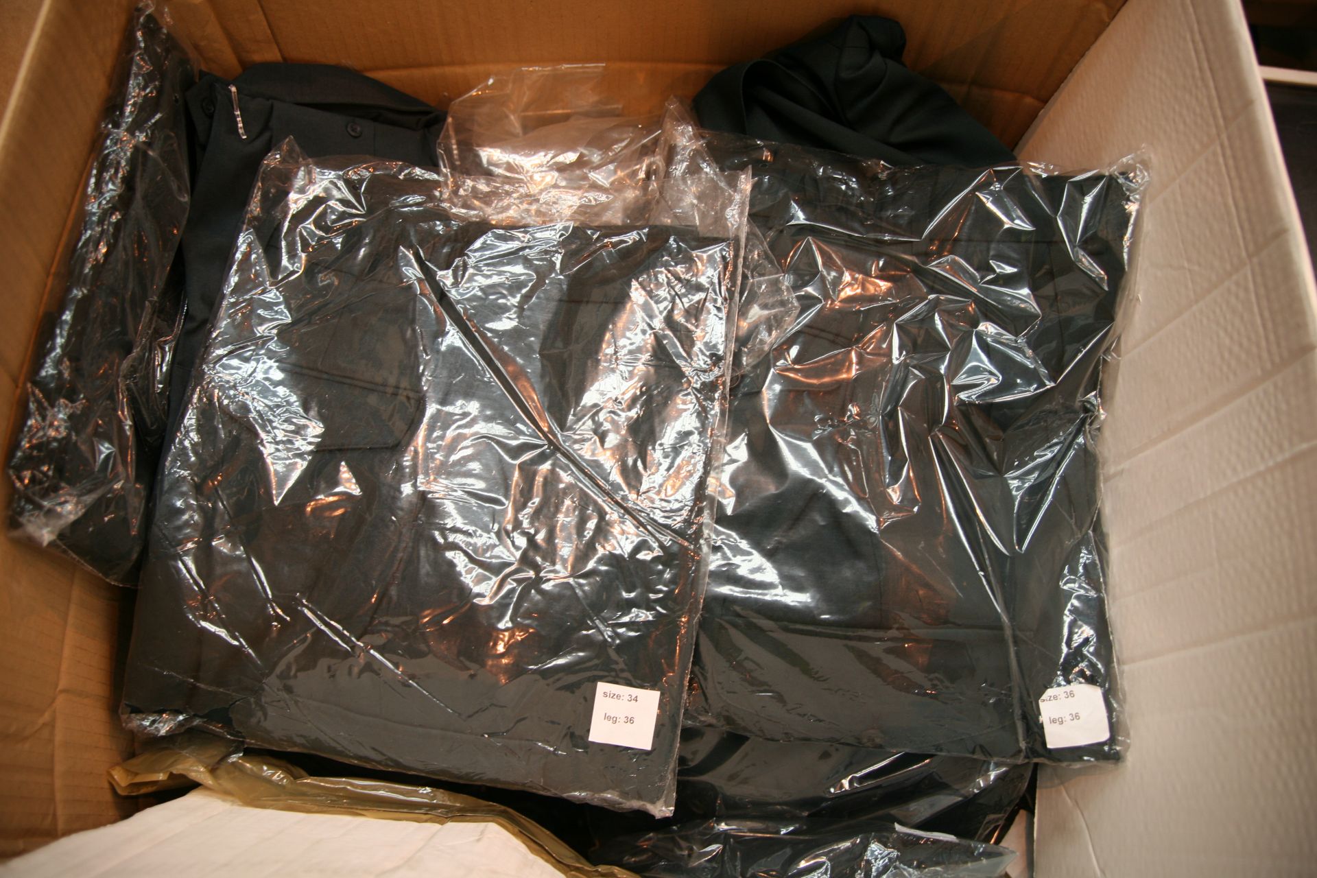 Box Of Various Ambulance Trousers