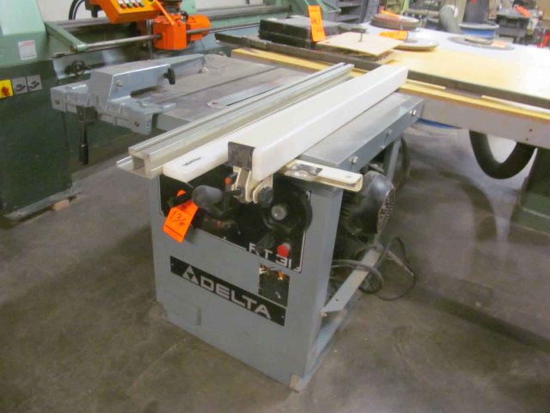 Delta tilting arbor table saw, M/N RT31, with 8" blade, 12" blade cap, with (2) ass't Delta unisaw