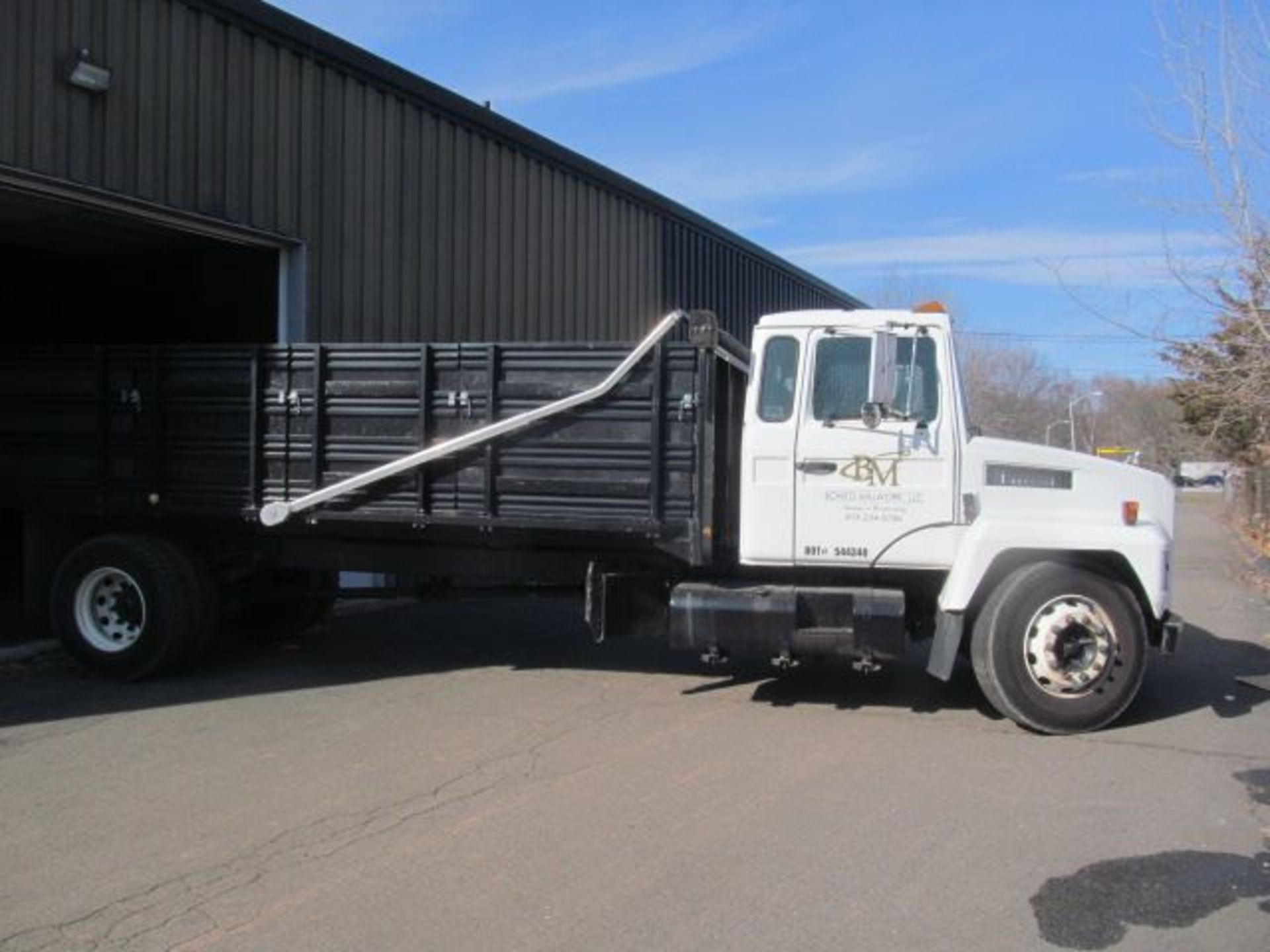 1997 Mack CS200P dump truck, Diesel, odometer reads 148,593, 6-speed transmission, single axle, with