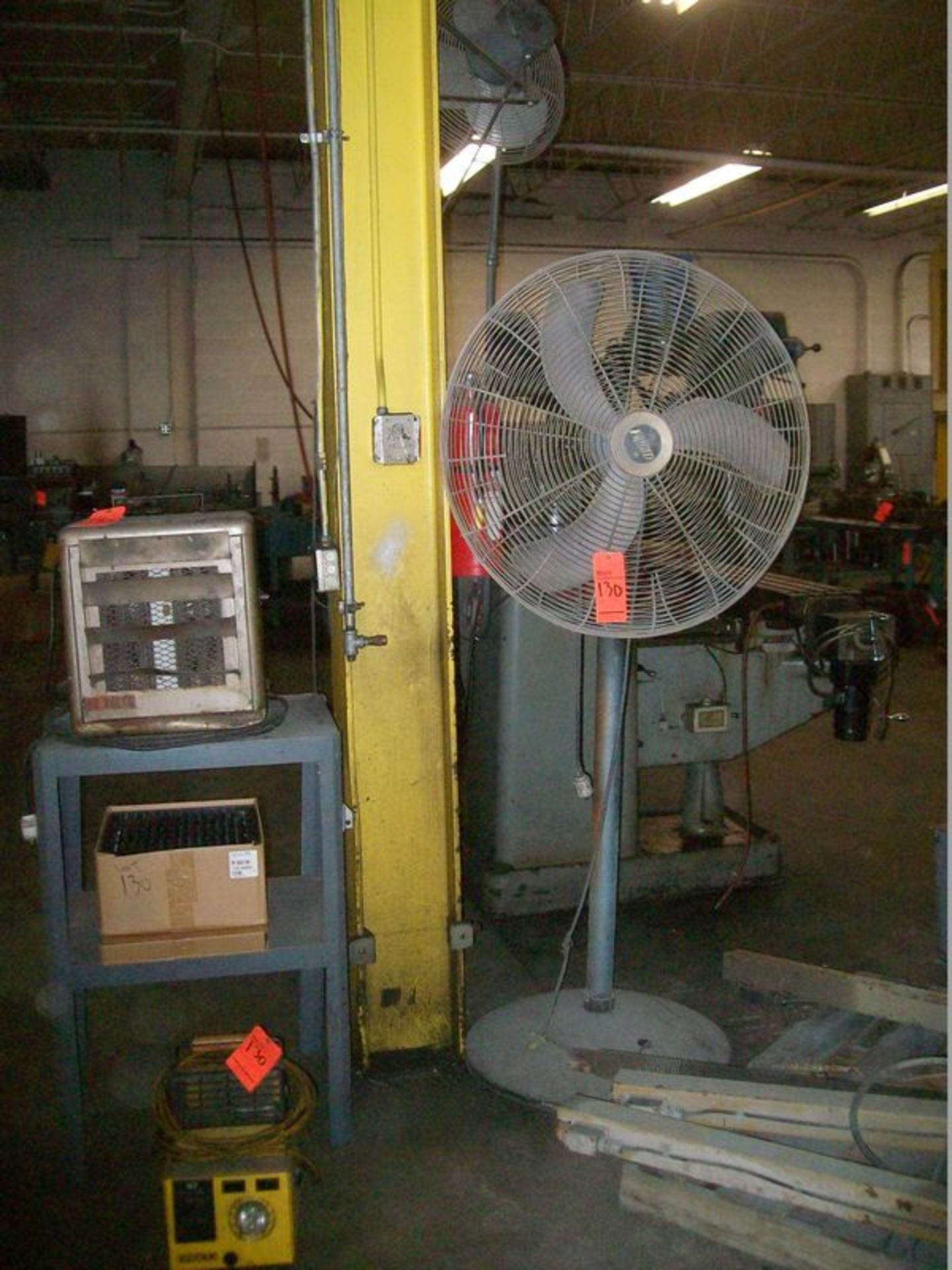 Lot includes (1) Frigid 32" pedestal fan, (1) New ventilator fan, (1) electric heater and (1)