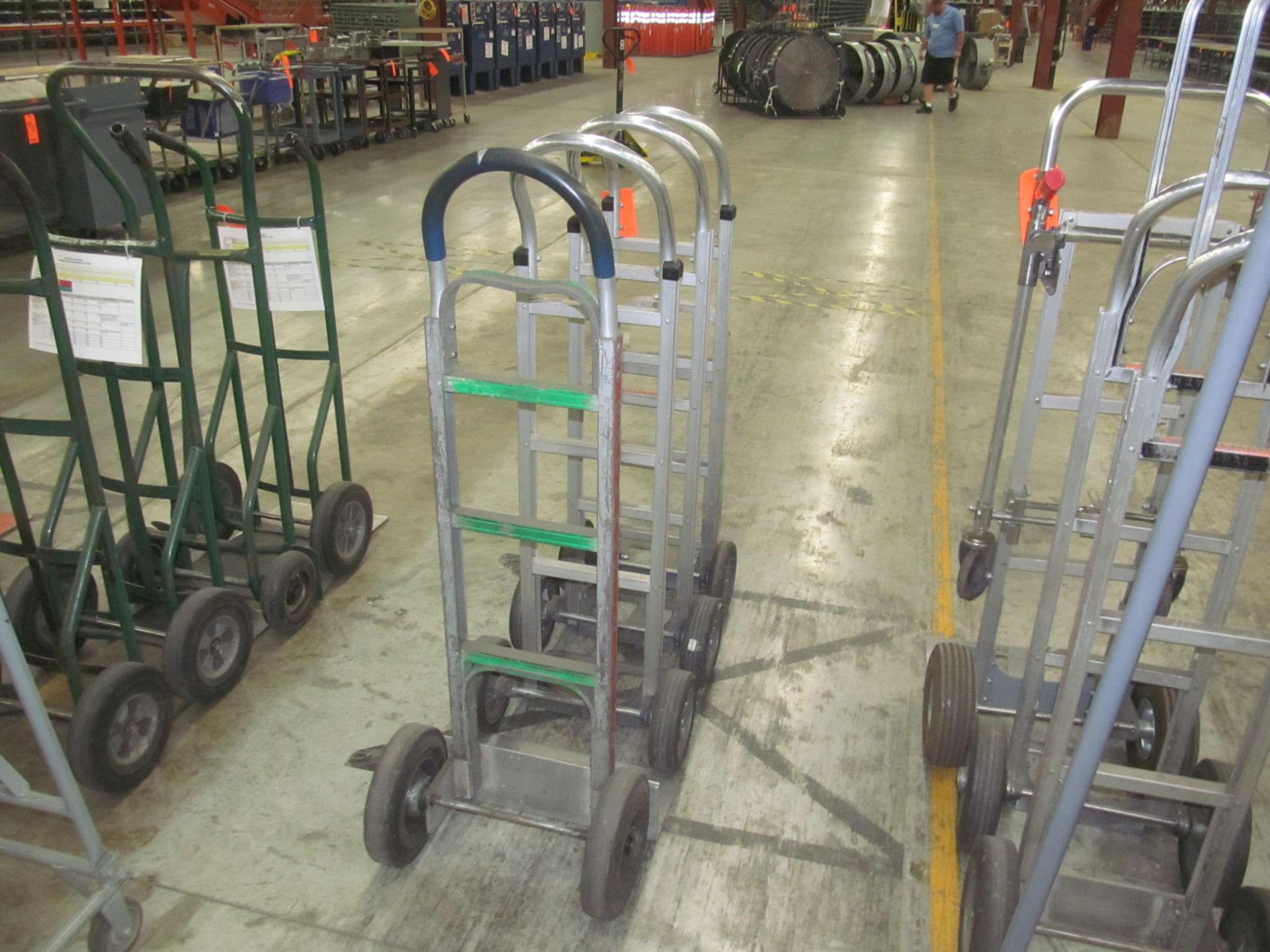 Lot of (4) assorted 2 wheel hand trucks, (3) Magliner, (1) with drop down platform extension, and (