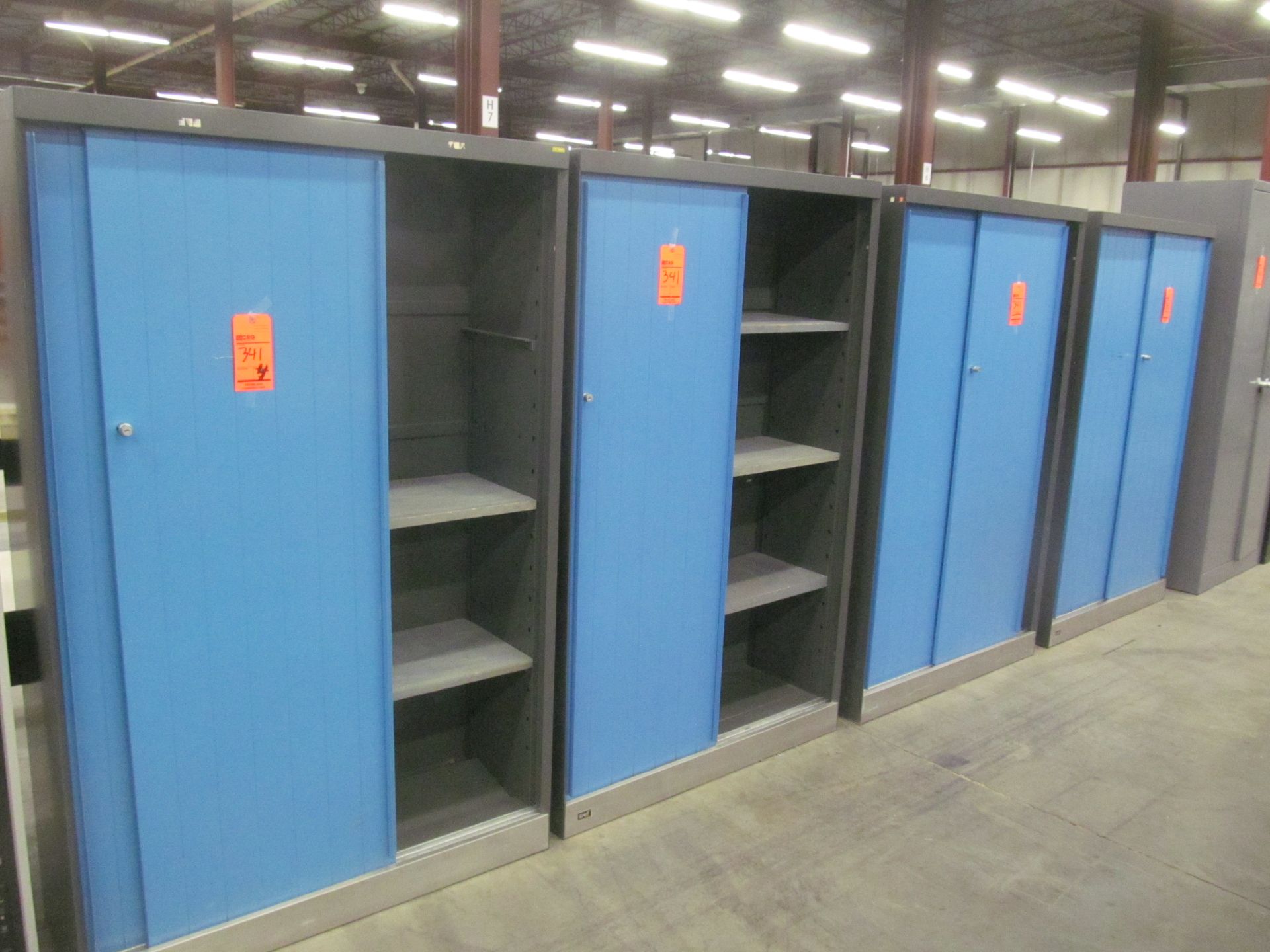 Lot of (4) metal storage cabinets, with dual sliding doors, 44" x 16" x 70"