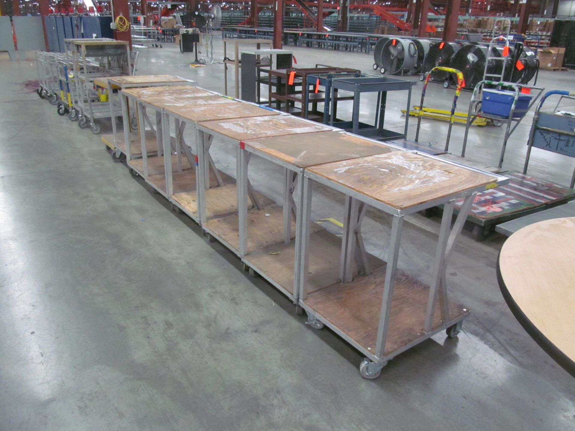 Lot of (8) assorted two tier 20" x 24" shop carts