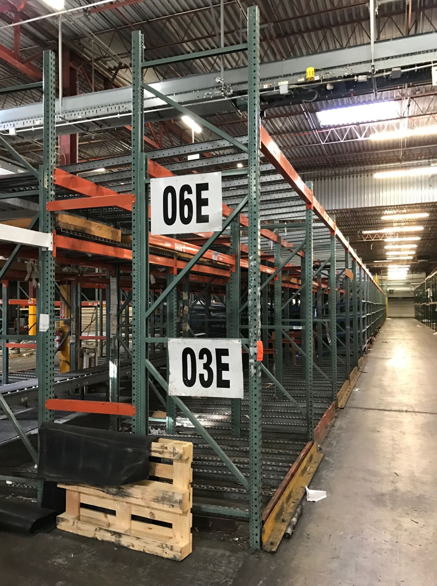 Lot of assorted flow rack type racking system including (26) sections, (54) assorted uprights 11'