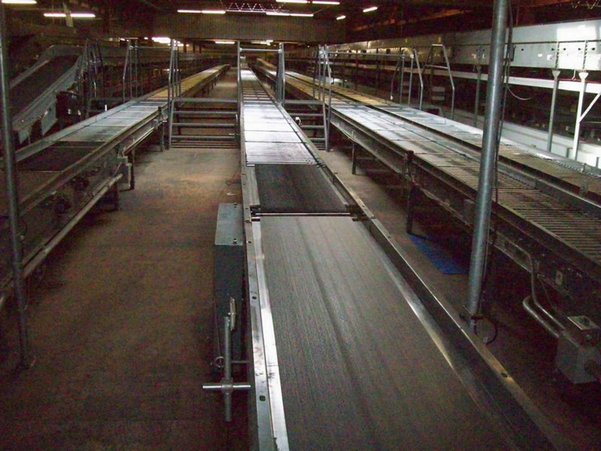 Lot of 900' +/- Buschman motorized conveyor, 24 1/2" wide with 18" belt-subject to entirety bid