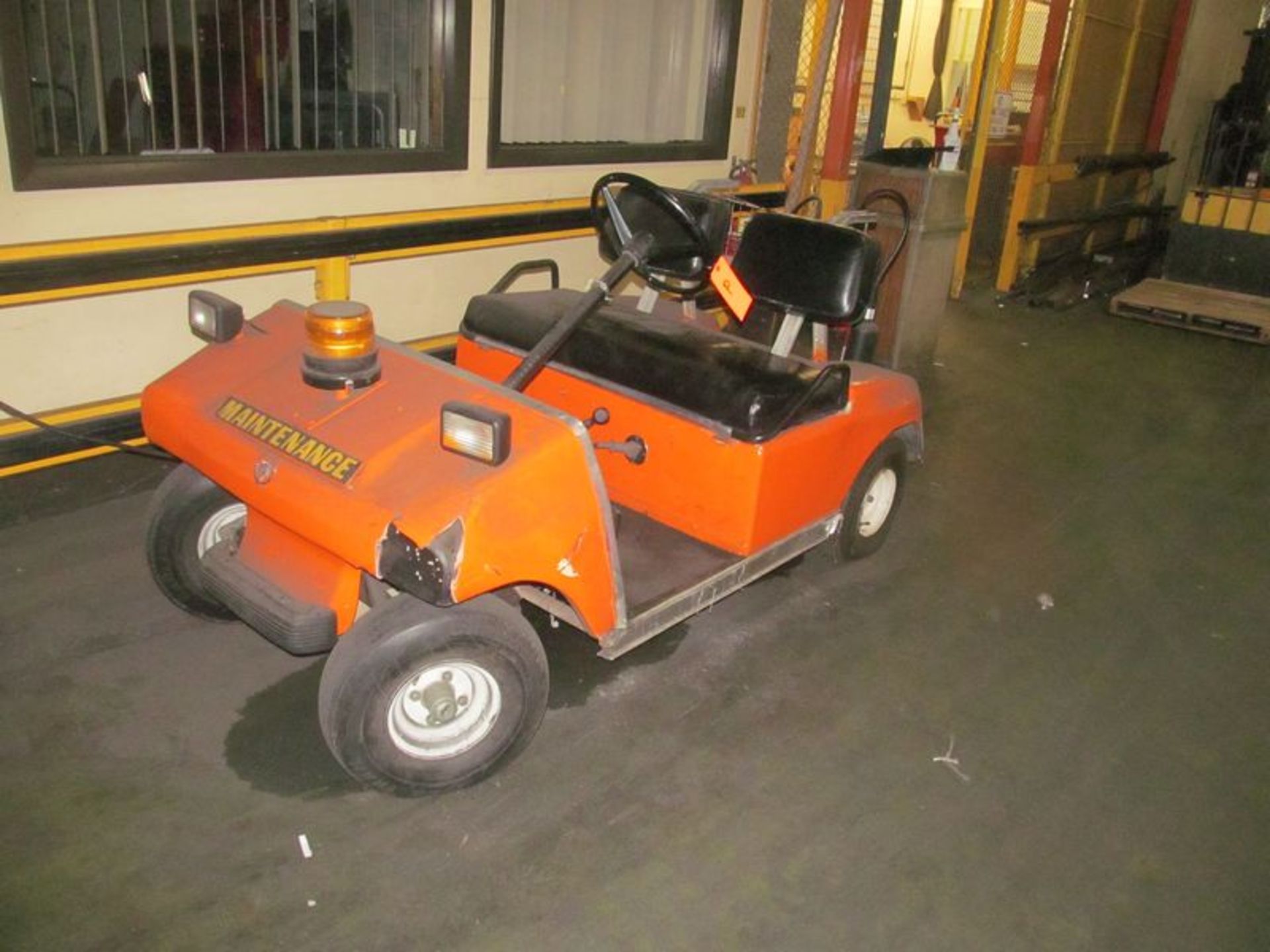 Electric golf cart-make unknown-with charger, and (2) fire extinguishers, (6) 12 volt batteries-