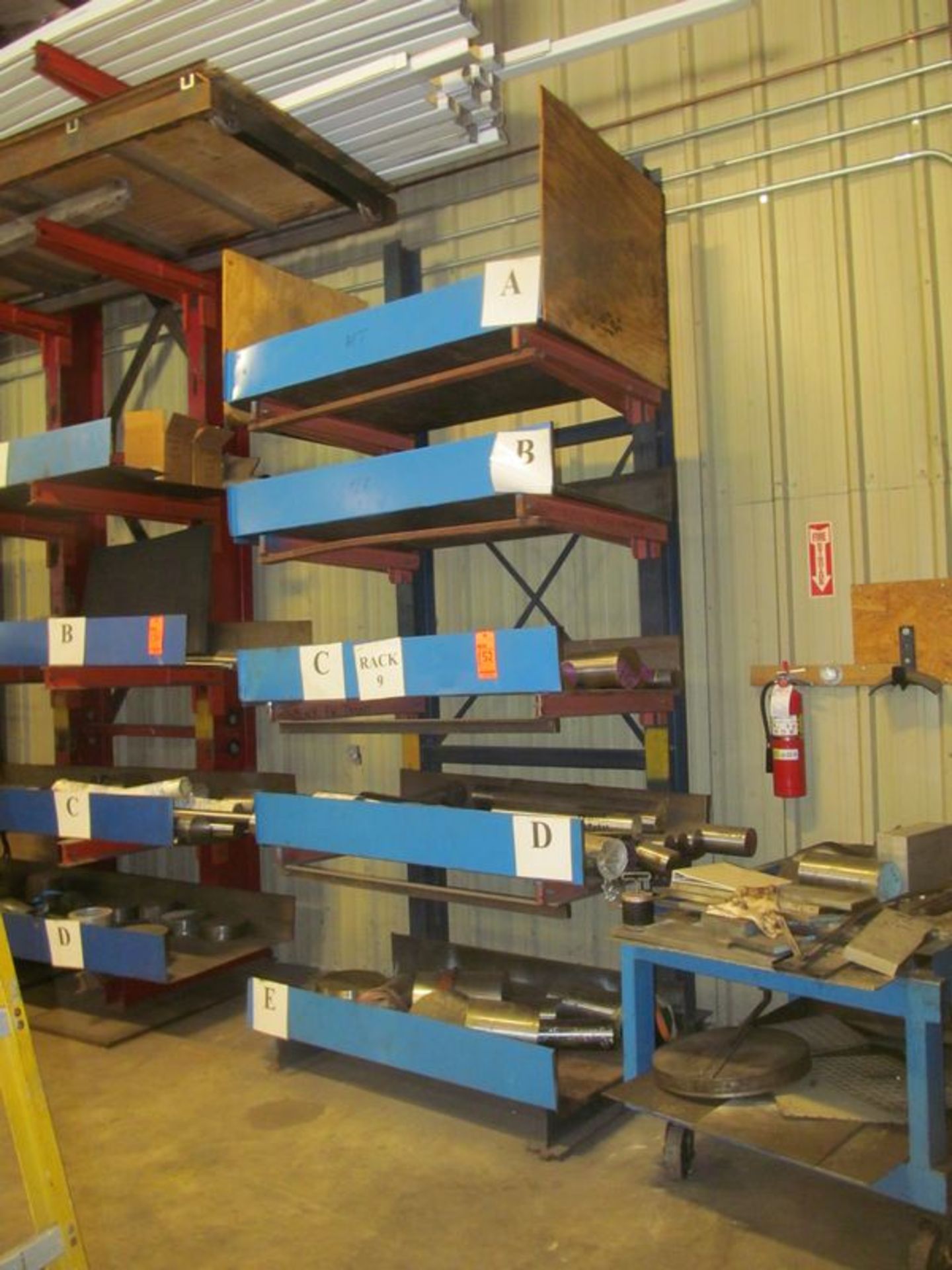 5 tier cantilevered metal stock rack, 52"w x 40" deep x 10' high with (8) 32" arms and (5)