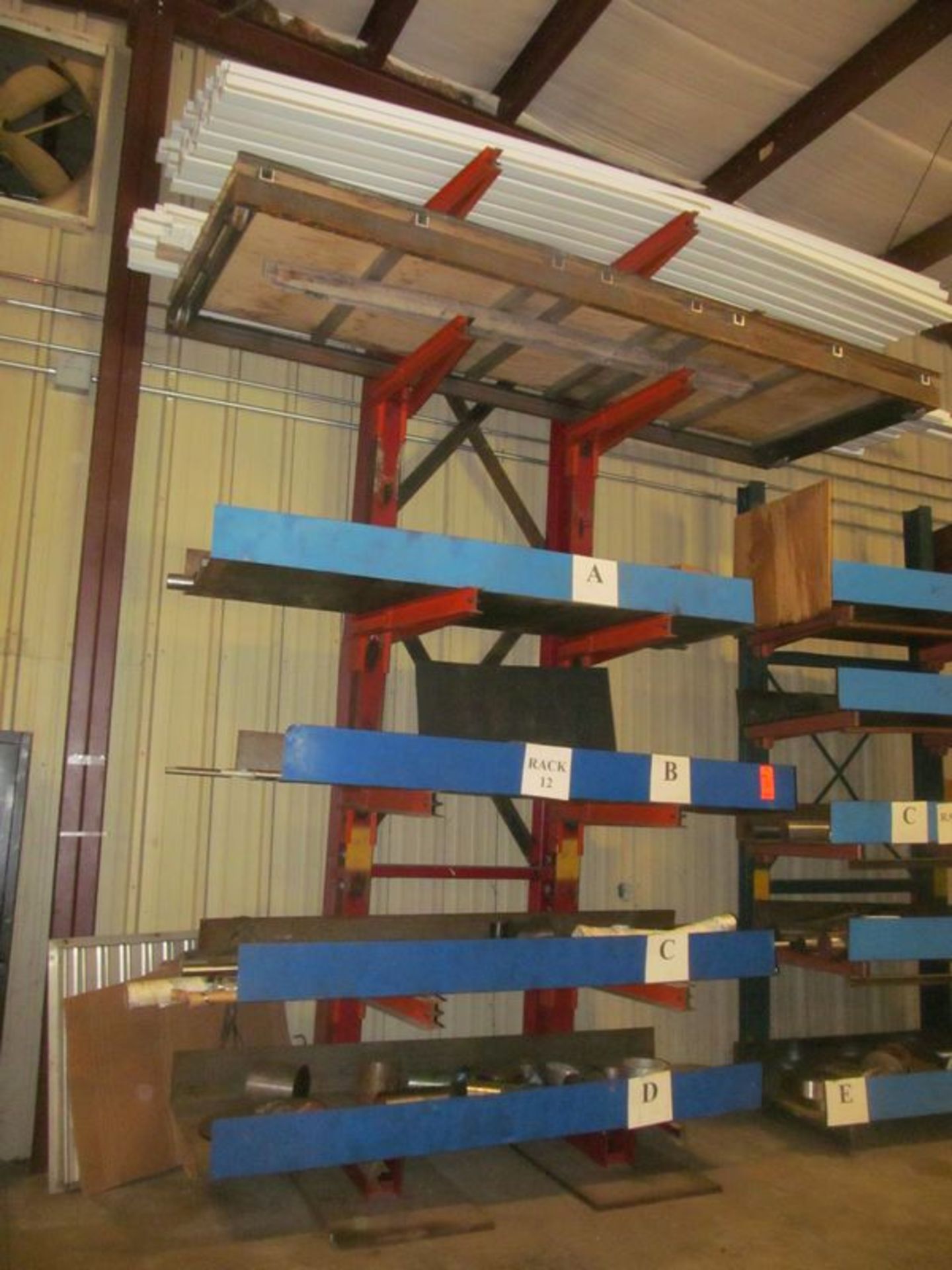 6 tier cantilevered metal stock rack, 48"w x 48" deep x 15' high with (10) 36" adjustable arms
