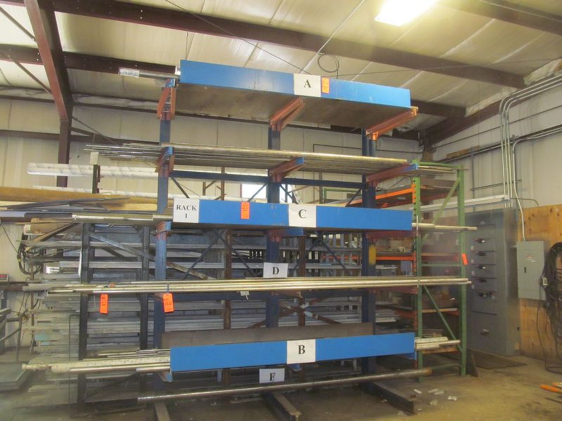 6 tier cantilevered metal stock rack, 102"w x 28" deep x 12' high with (15) 32" adjustable arms