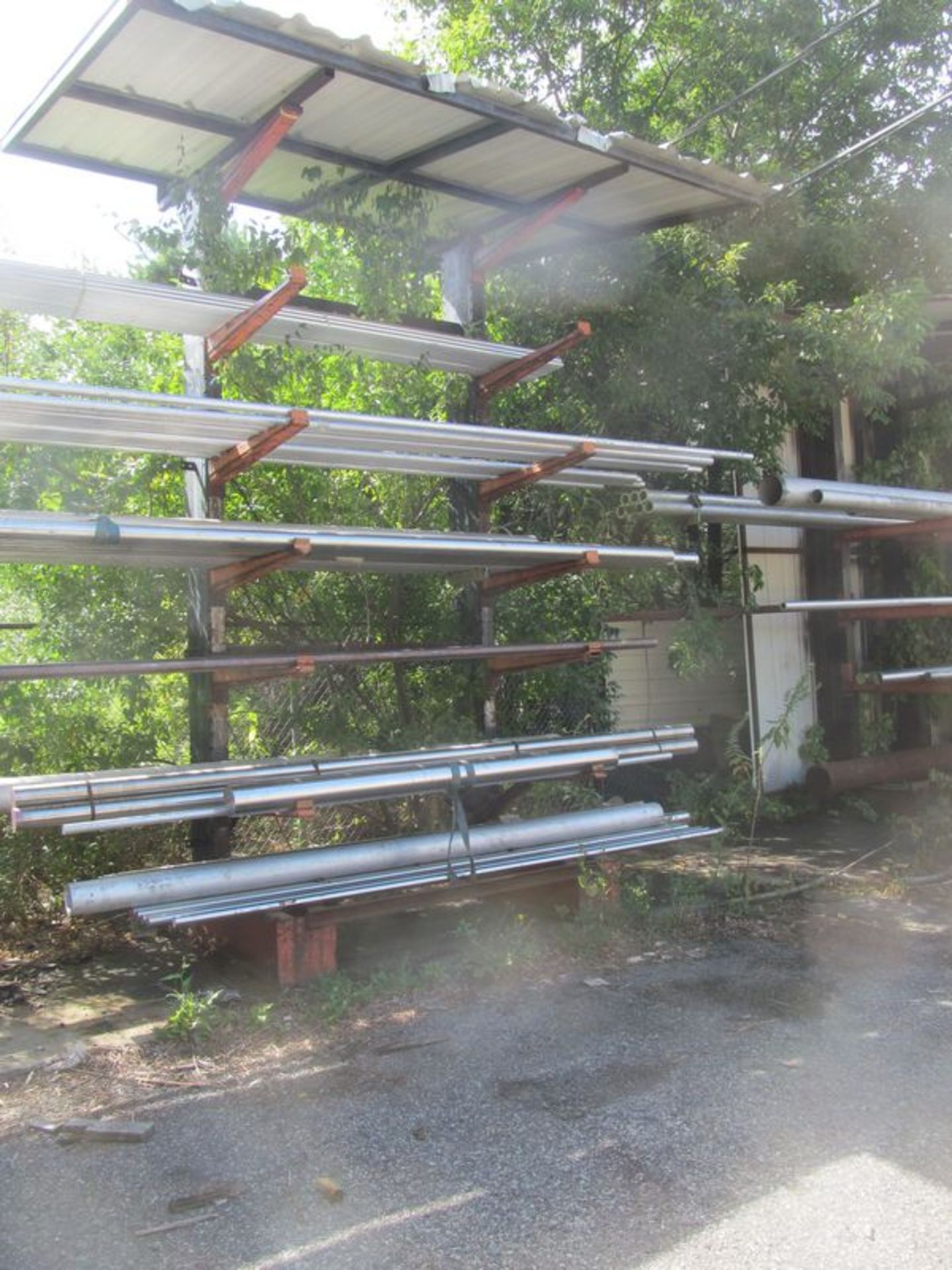 6 tier cantilevered metal stock rack, 76"w x 60" deep x 14' high with cover and (12) 44" - Image 2 of 2