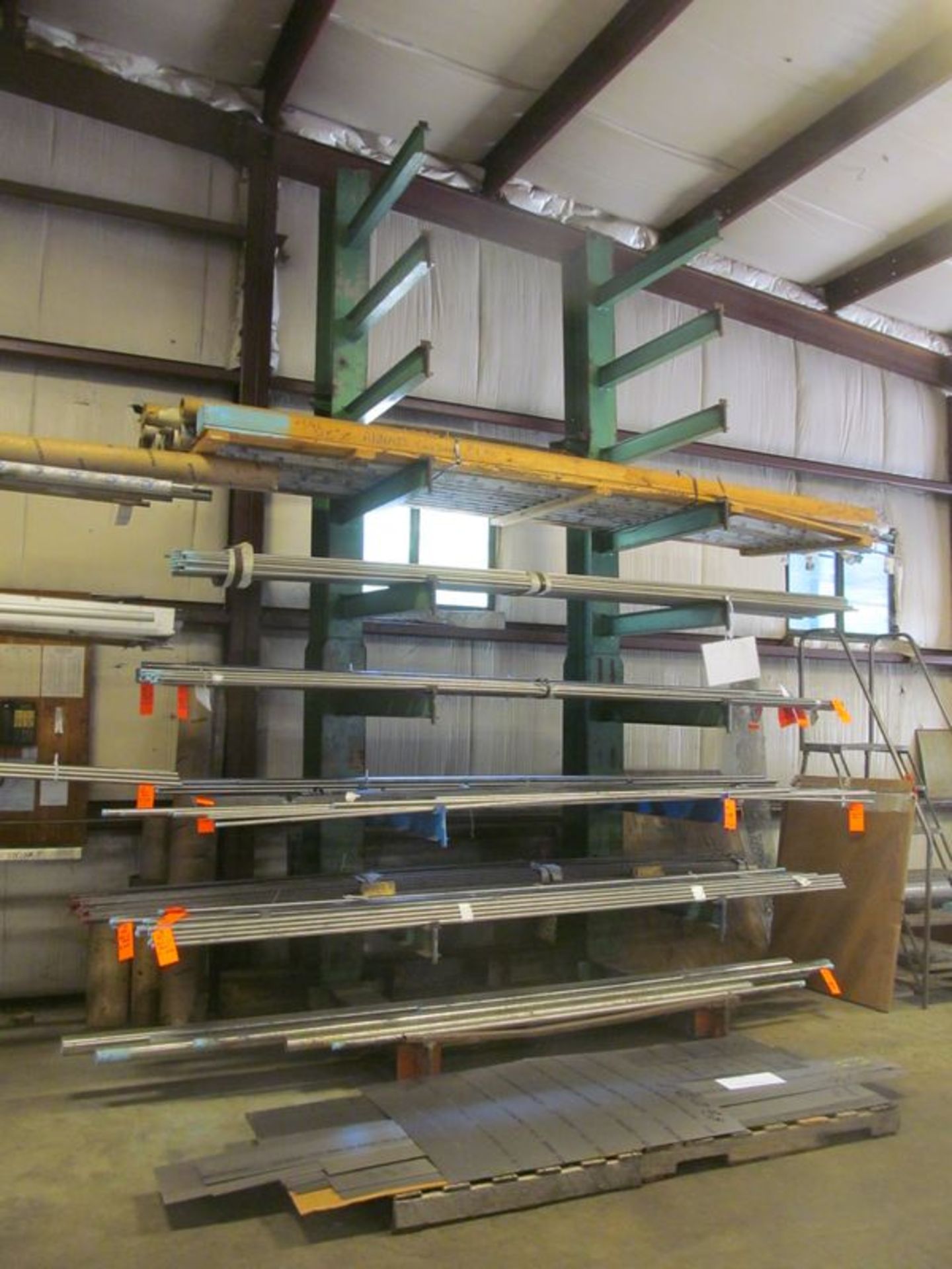 9 tier cantilevered metal stock rack, 66"w x 56" deep x 15' high, with (16) 44" arms, no contents