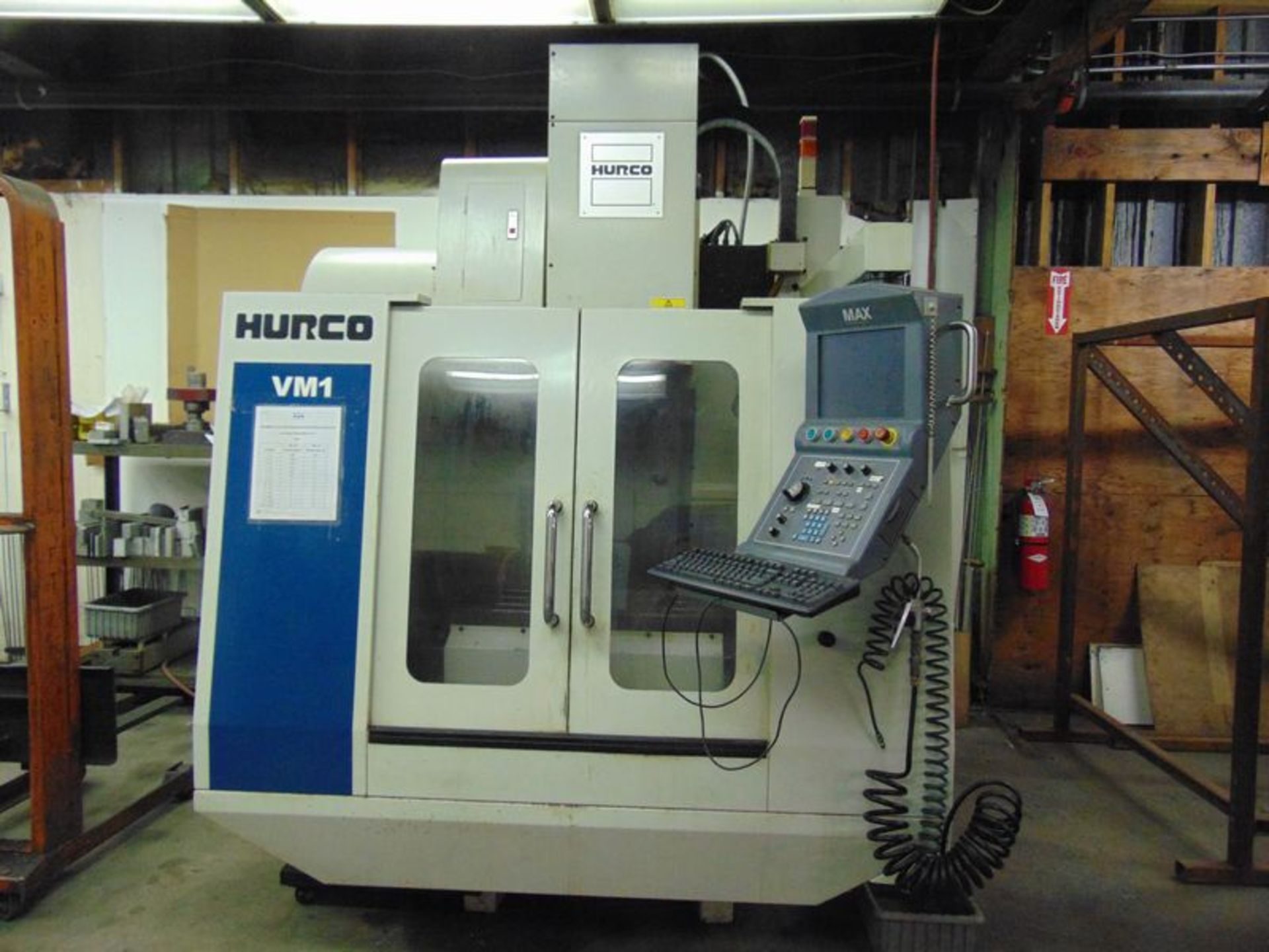 2002 Hurco VM1 16 position automatic tool changer, Max CNC controls, (2) Kurt 6" machine vises,