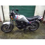 A 1988 Yamaha XS400, registration number E763 BGH, frame number 16Y010995, silver.