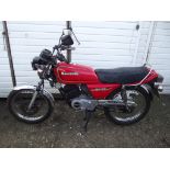 A ***1994 (not 1981) Kawasaki KH125, registration number L552 RYB (not L53 RYB), red.