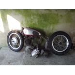 A 1947 BSA B31 restoration project, engine number XB31 2303, maroon.