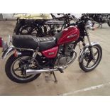 EXTRA LOT: A 2001 Suzuki GN125, registration number FE51 POU, red.