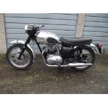 A 1959 Triumph 5T speed twin, registration number ASV 185, blue.