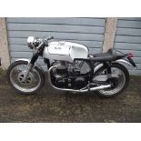 A 1960 Norton Dominator 99 café racer, registration number 715 UYL, silver.