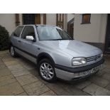 A 1997 Volkswagen Golf GTi, registration number P601 KYB, silver.