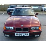 EXTRA LOT: A 1995 BMW 328i coupé, registration number M190 LPK, metallic Calypso red.