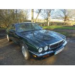 EXTRA LOT: A 1998 Jaguar XJ8, registration number R666 DMH, dark green.