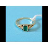 An 18ct gold, emerald and diamond ring,