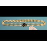 A two strand pearl necklace, with a 9ct