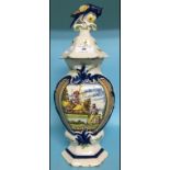 A Dutch Delft polychrome vase and cover,