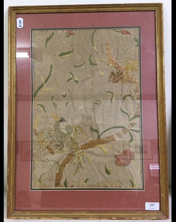 An embroidered panel, decorated birds am