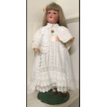 An Armand Marseille bisque head doll, wi