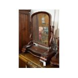 A Victorian mahogany dressing mirror, 60 cm wide, another, 49 cm wide, a 1930s oak sideboard,