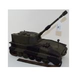 A painted wood model of a tank, 13.5 cm