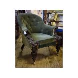 An early Victorian button back armchair,
