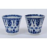 A pair of Chinese porcelain cups, of hex