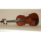 A violin, with a 14 inch two piece back,