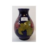 A Moorcroft pottery Clematis pattern vas