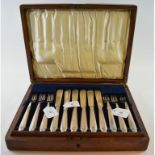 A set of twelve silver fish knives and forks, Carrington & Co, London 1908,