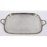 A silver two handled tray, of rectangular form, Sheffield 1924, approx. 78.