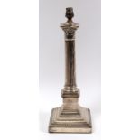 A silver table lamp base, in the form of a Corinthian column, Sheffield 1912, 39.