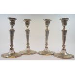 A set of four late 18th century style silver plated candlesticks, of navette form,
