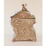 A plated caddy, with Rococo style decoration,