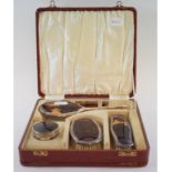 A silver mounted faux tortoiseshell five piece dressing table set, Birmingham 1927, cased,