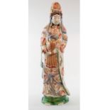 A Chinese figure, of a sage holding a sc