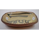 A Winchcombe pottery slipware dish, 25 c