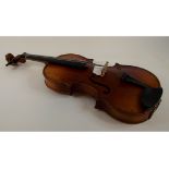 A violin, with a 13 inch two piece back