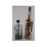 A Folk Art God-in-a-Bottle, 30 cm high,