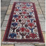 A Persian Afshar runner, 242 x 100 cm