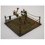 A painted metal group, boxing frogs, 12.