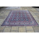 A Persian Tehran carpet, with repeating